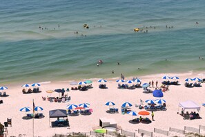 On the beach, sun-loungers, beach towels
