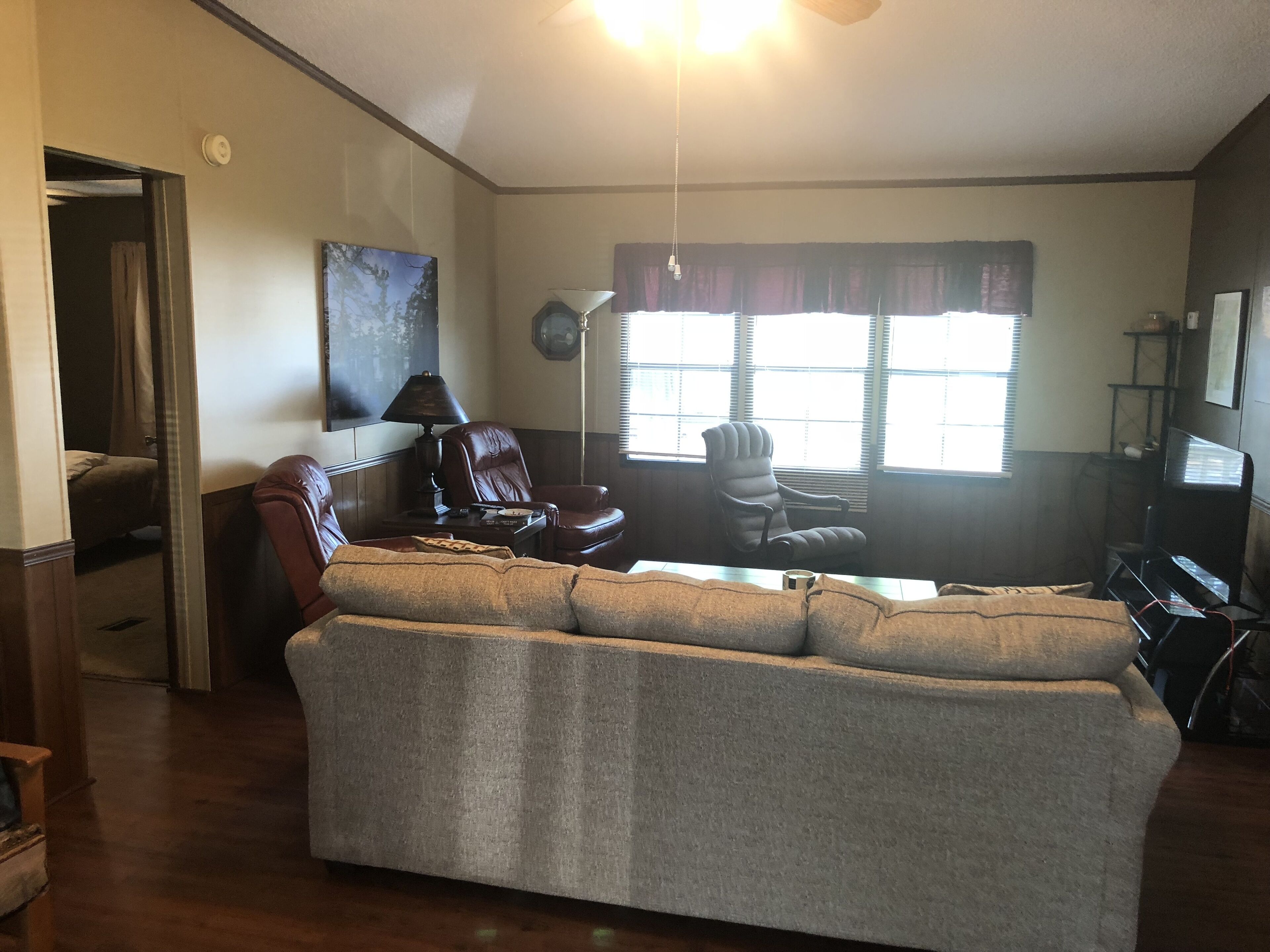 Fish cleaning station, screened back porch, covered front porch, fire pit.   