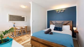 1 bedroom, desk, iron/ironing board, travel cot