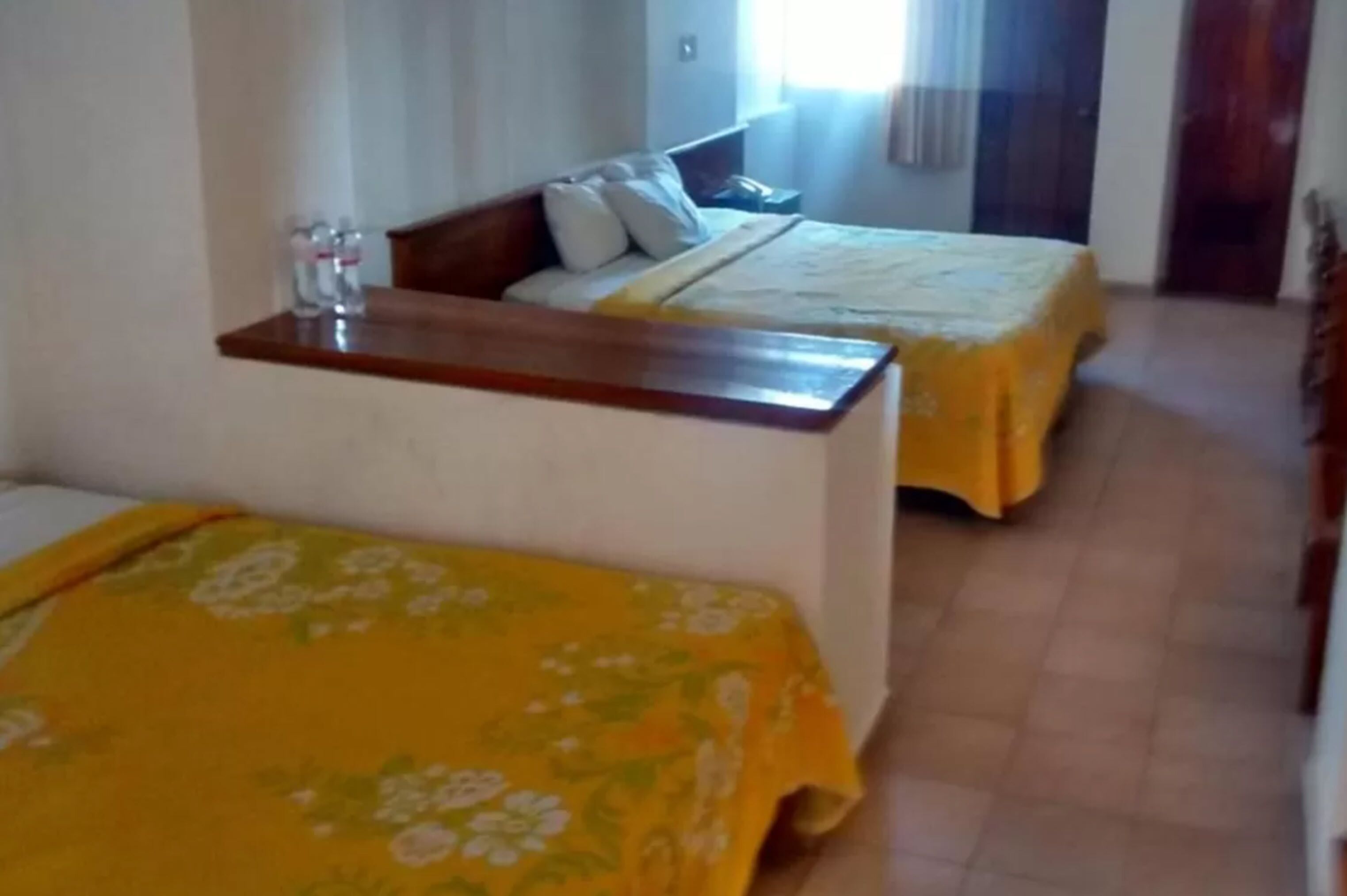 economy quadruple room, multiple beds, non smoking | 1 bedroom, blackout curtains, free wifi, bed sheets