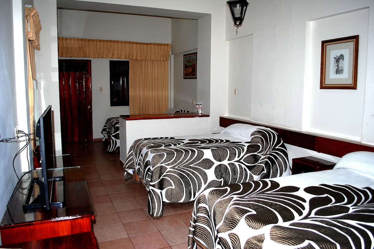 Economy Triple Room, Multiple Beds, Non Smoking | Blackout drapes, free WiFi, bed sheets