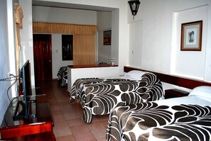 Economy Triple Room, Multiple Beds, Non Smoking | Blackout drapes, free WiFi, bed sheets - Hotel Posada Del Sol (Apatzingan)