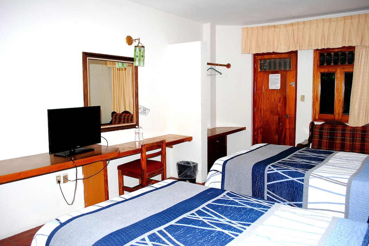 economy double room, multiple beds, non smoking | 1 bedroom, blackout curtains, free wifi, bed sheets