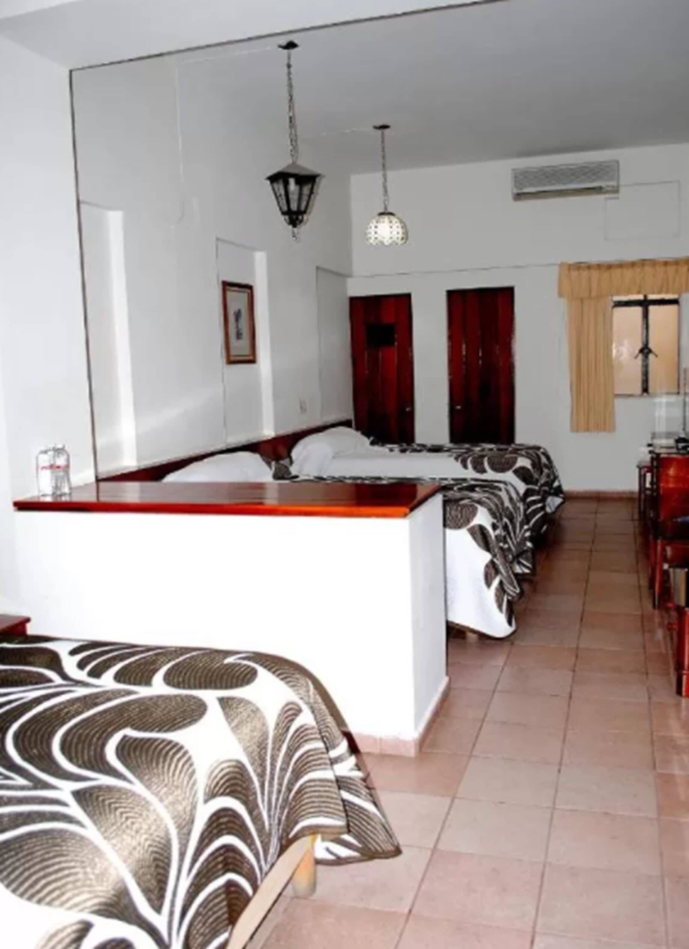 economy triple room, multiple beds, non smoking | 1 bedroom, blackout curtains, free wifi, bed sheets