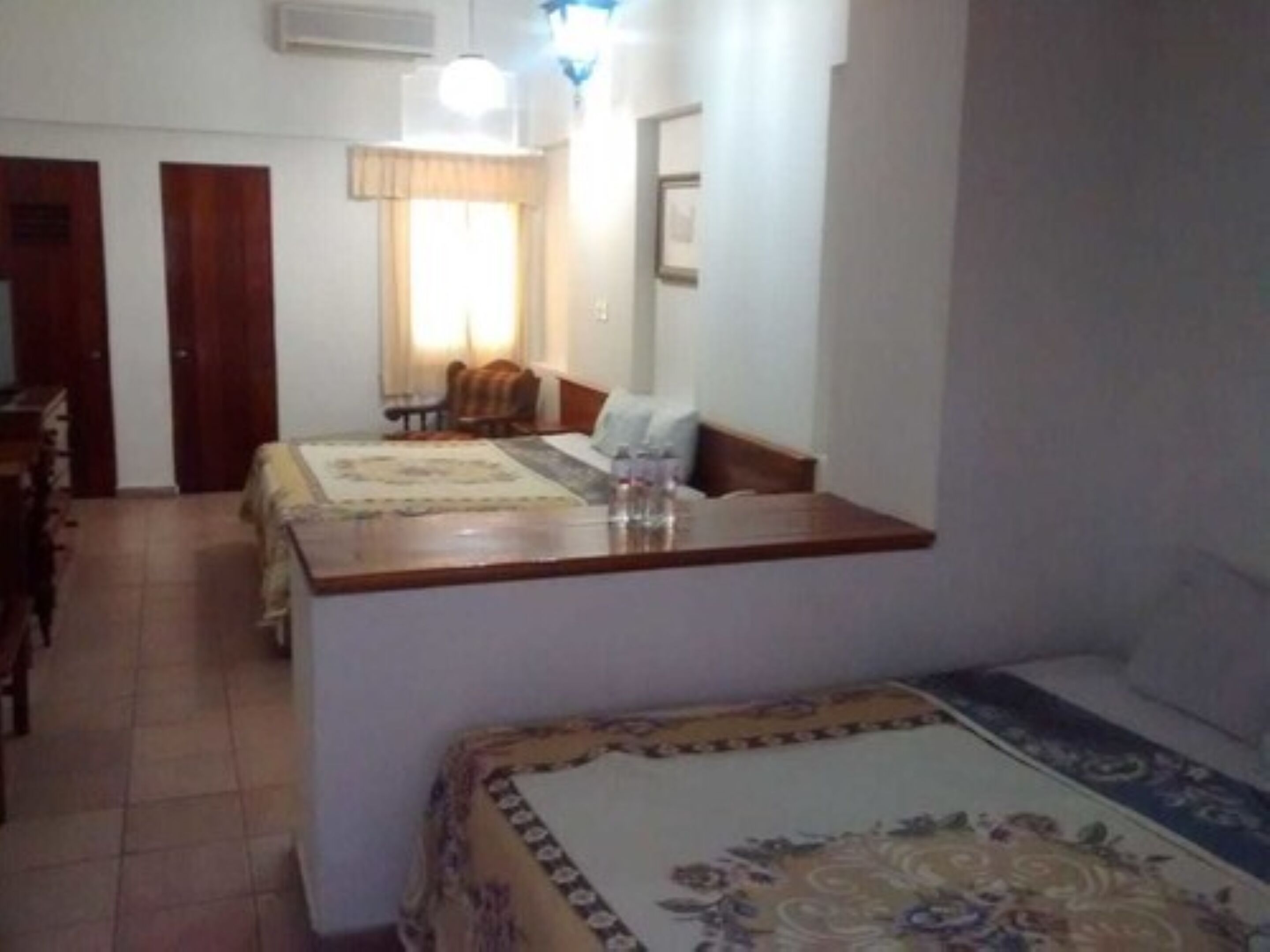 economy quadruple room, multiple beds, non smoking | 1 bedroom, blackout curtains, free wifi, bed sheets