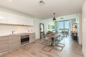 Luxury Condo, Multiple Beds, Kitchen, Bay View | In-room dining