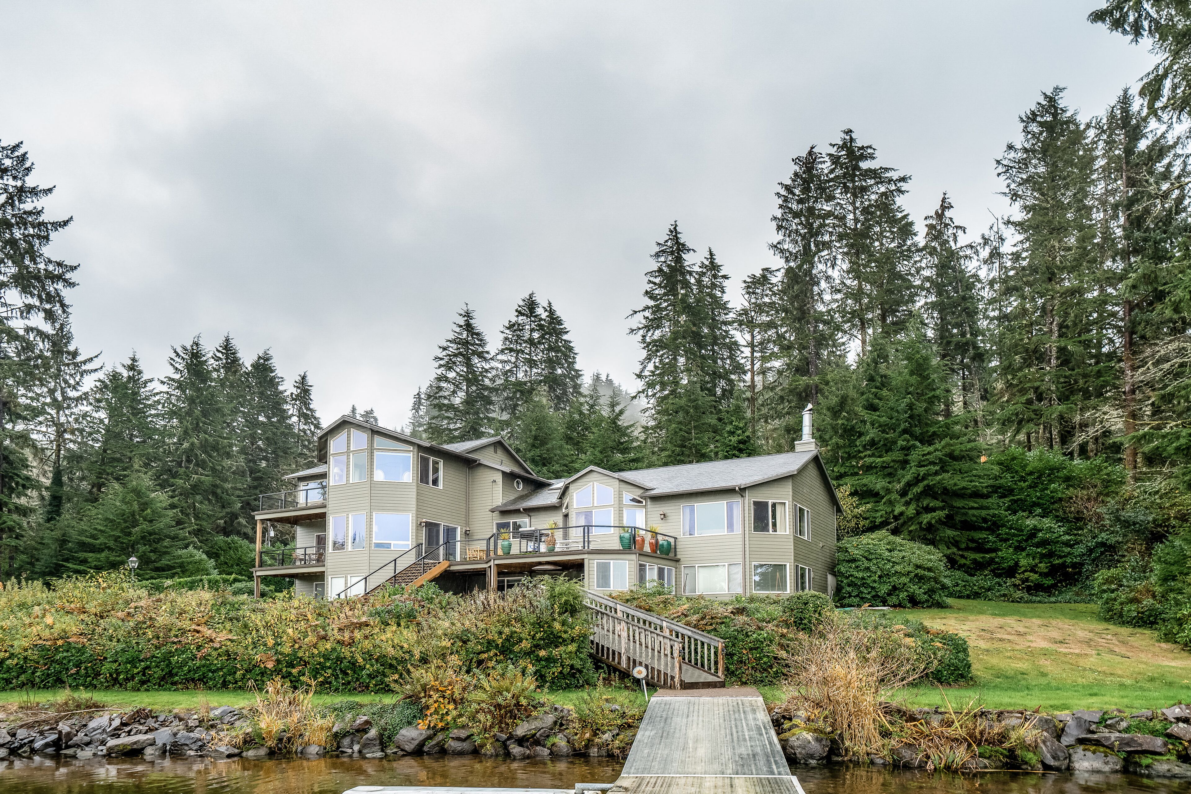 Dog-friendly waterfront house w/ a private hot tub, game room, & dock