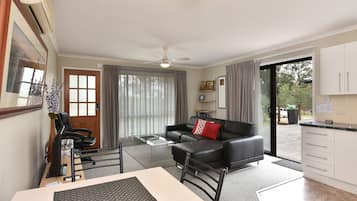 Cottage, 1 Queen Bed | Living area | Flat-screen TV