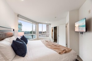 1 bedroom, desk, iron/ironing board, travel cot