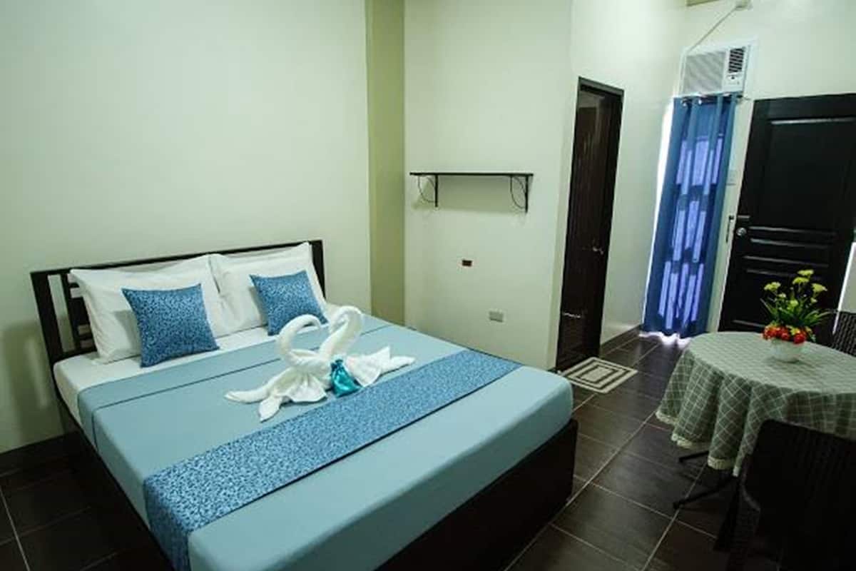 Ropa de cama de alta calidad, minibar y cortinas blackout 
