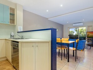 Apartment, 2 Bedrooms (1 Queen, 1 Tri-bunk) | Private kitchen | Full-sized fridge, microwave, oven, stovetop - 121 at The Waves (Cowes)