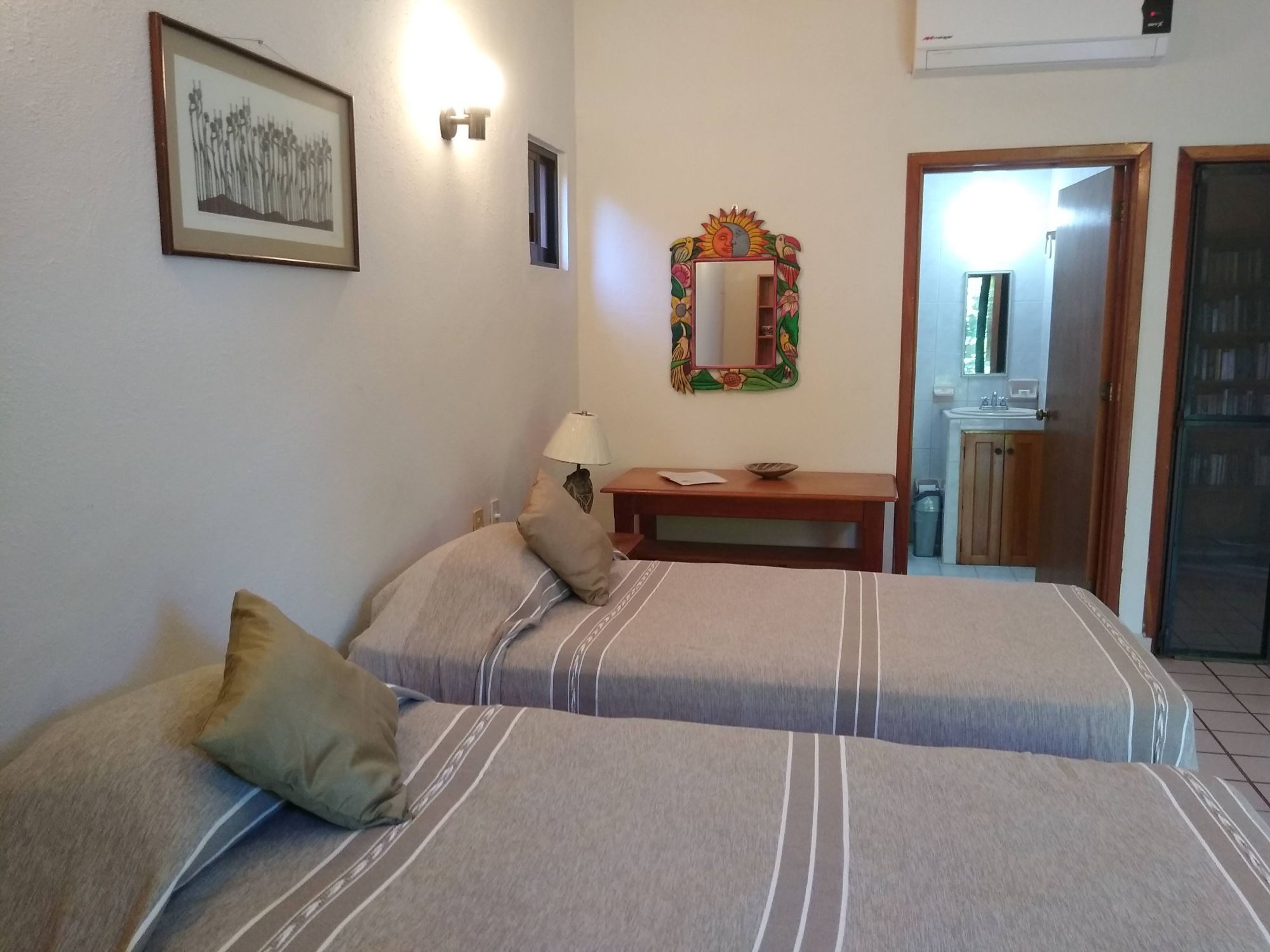Spacious room in family guesthouse walking distance to La Ropa beach