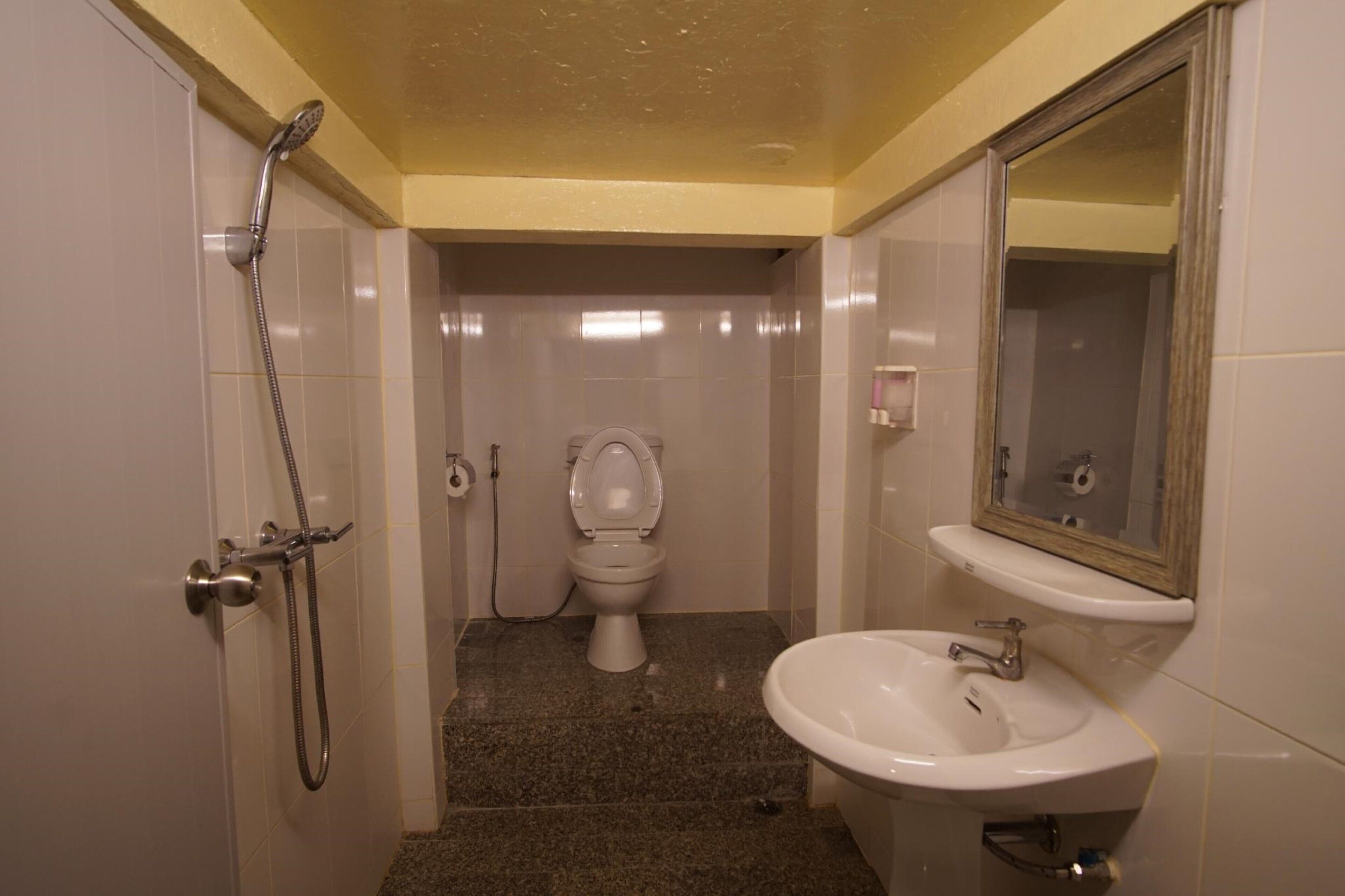 superior twin room | bathroom | shower, eco-friendly toiletries, towels