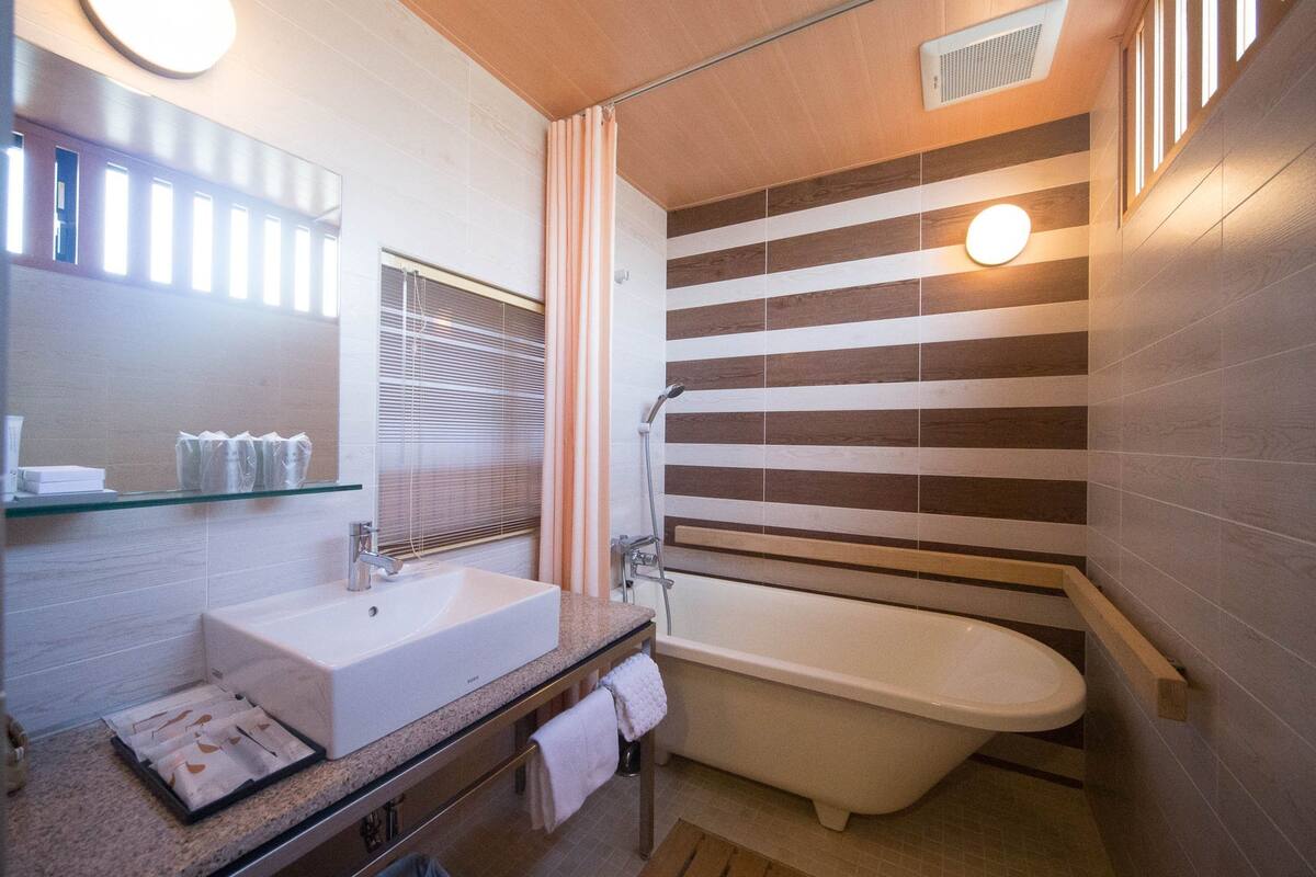 free toiletries, hair dryer, slippers, electronic bidet