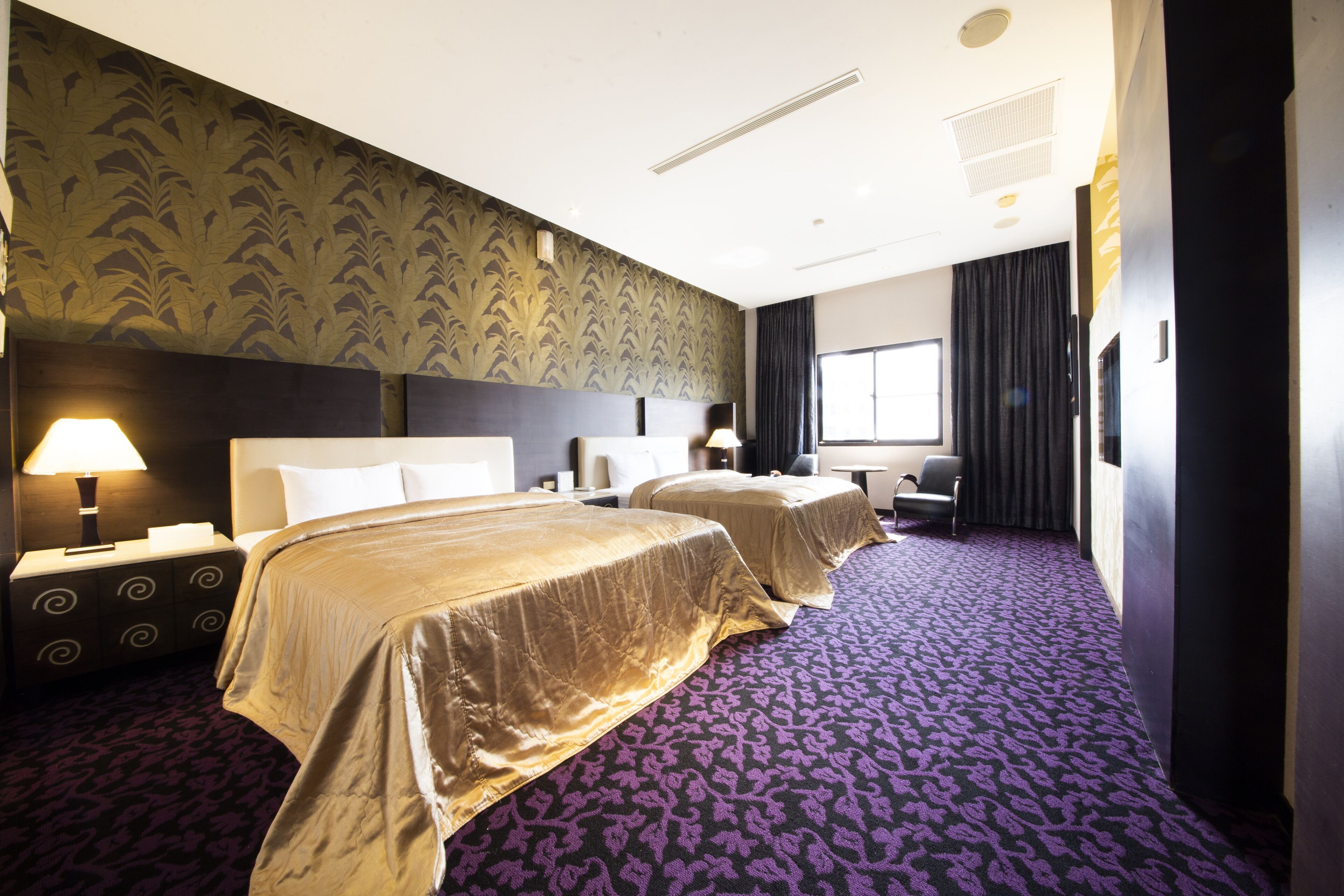 business quadruple room | down duvets, desk, blackout curtains, soundproofing