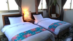 Habitación doble Gallery | Escritorio, cortinas blackout, wifi gratis y ropa de cama 