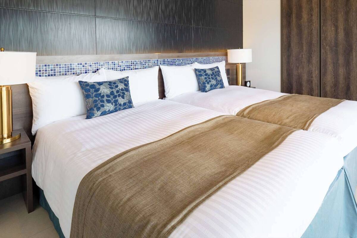 Down comforters, minibar, in-room safe, blackout drapes