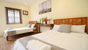 Premium bedding, individually furnished, desk, laptop workspace