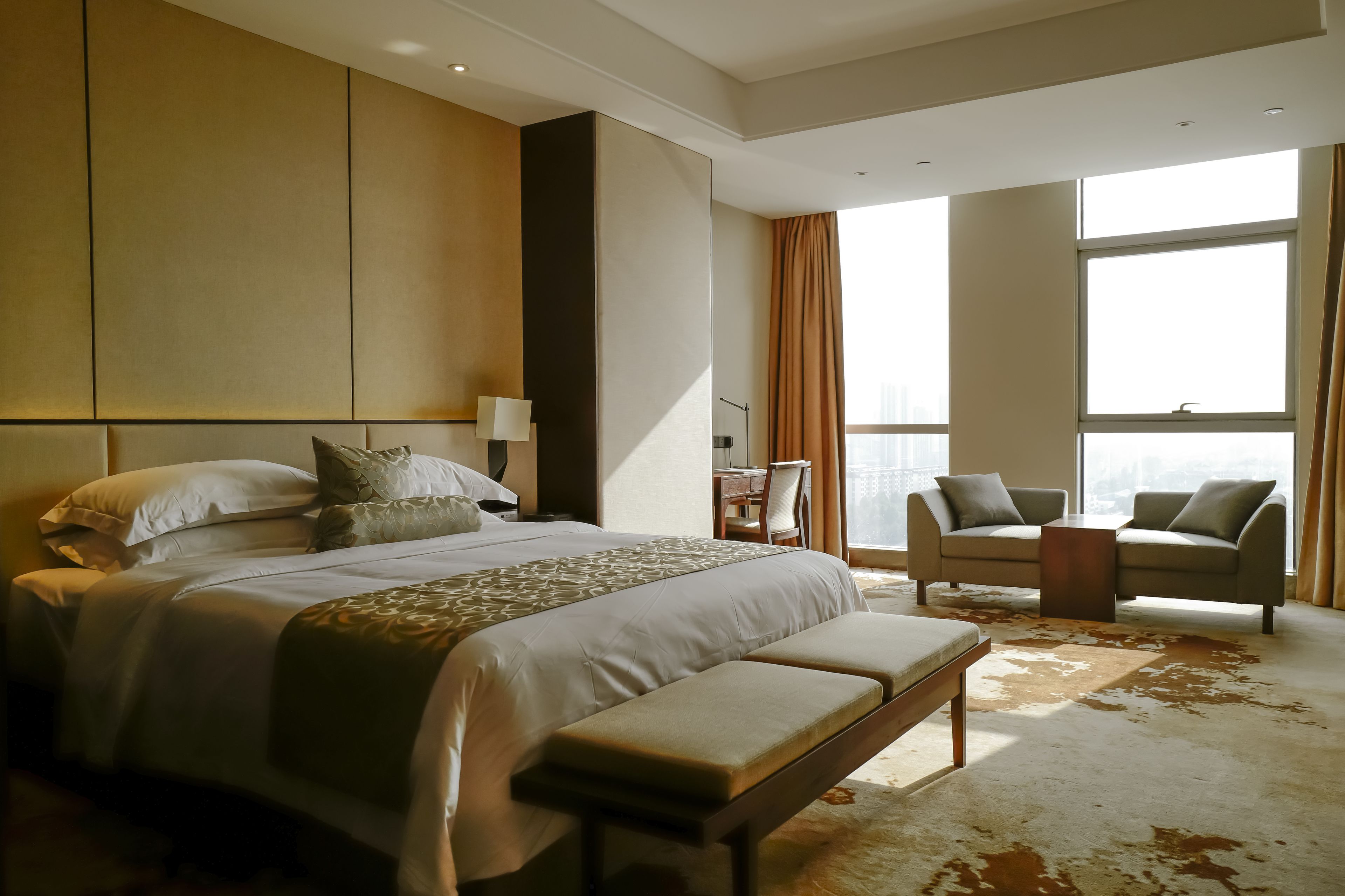 deluxe double room, 1 queen bed | down duvets, in-room safe, desk, blackout curtains