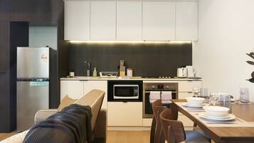 Deluxe Apartment, 1 Bedroom | Living room | LED TV