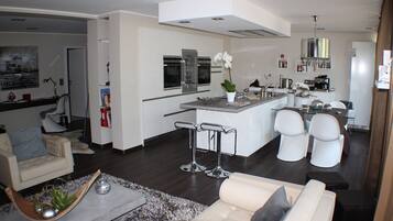 Penthouse Apartment 1, Balcony (incl. Cleaning Fee) | Private kitchen | Full-size fridge, oven, stovetop, dishwasher