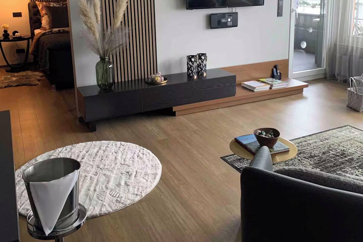 Luxury Condo | Living area | 48-inch flat-screen TV with satellite channels, TV, fireplace