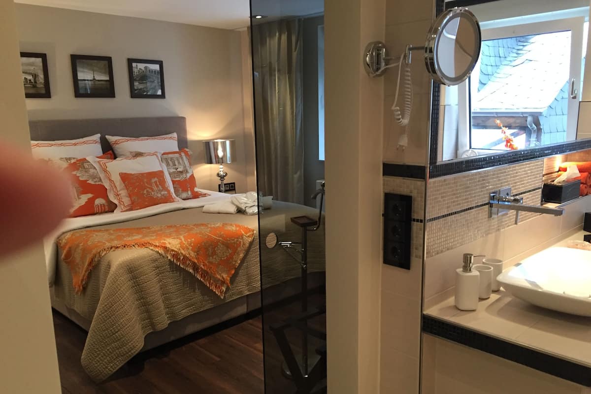 Deep soaking tub, rainfall showerhead, free toiletries, hair dryer