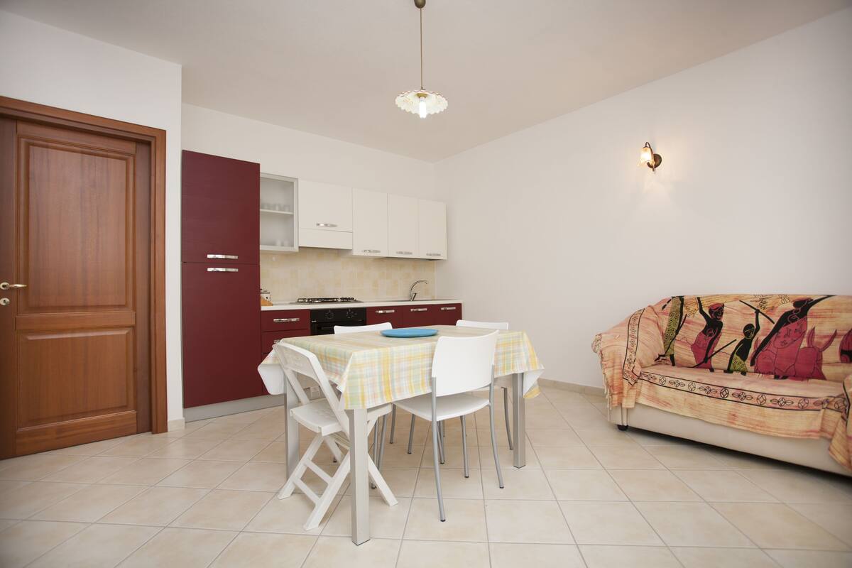 Appartement, 2 chambres, rez-de-chaussée | Coin séjour | Télévision à écran plat