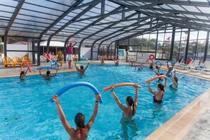 Seasonal outdoor pool, pool umbrellas, pool loungers