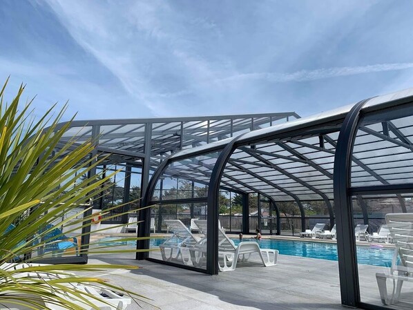 Seasonal outdoor pool, pool umbrellas, pool loungers