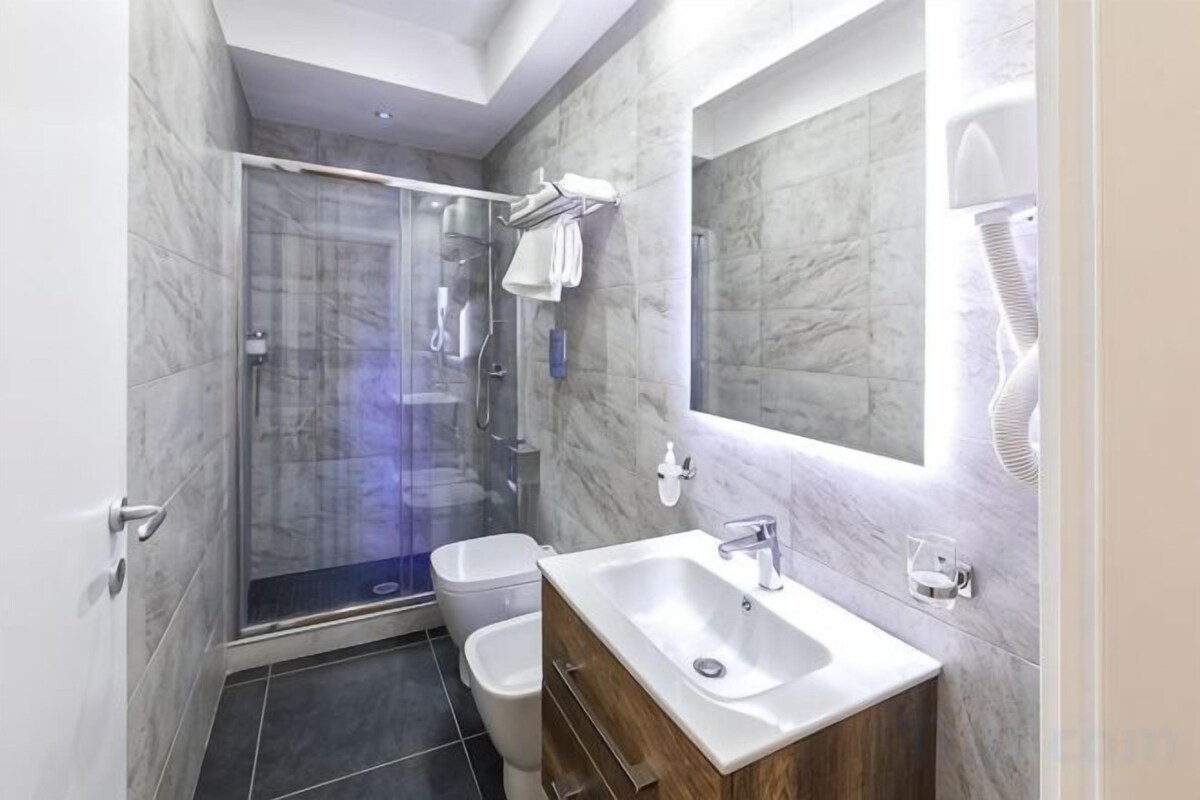 Bathroom | Shower, hair dryer, bathrobes, slippers