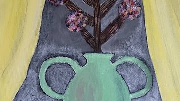 A painting of a vase with flowers and a striped pattern below.