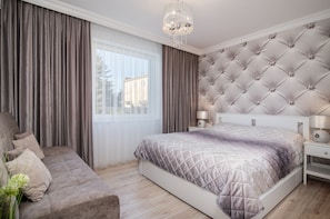 Pillow-top beds, blackout curtains, iron/ironing board, free WiFi