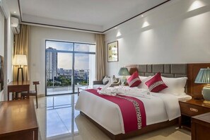 Premium bedding, pillowtop beds, desk, blackout drapes