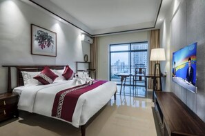 Premium bedding, pillowtop beds, desk, blackout drapes