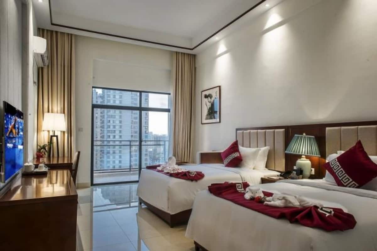 Premium bedding, pillowtop beds, desk, blackout drapes
