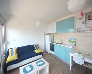 Apartment, 1 Bedroom | Living area | LED TV