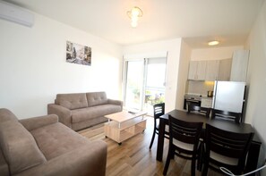 Apartamento (1) | Zona de estar | Una televisión LCD