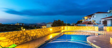 Seasonal outdoor pool, pool umbrellas, pool loungers