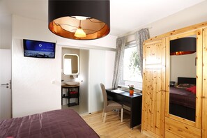 Standard Double Room | Living area | 65-inch flat-screen TV with satellite channels, TV