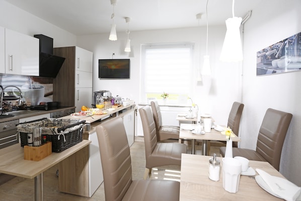 65-inch flat-screen TV with satellite channels, TV