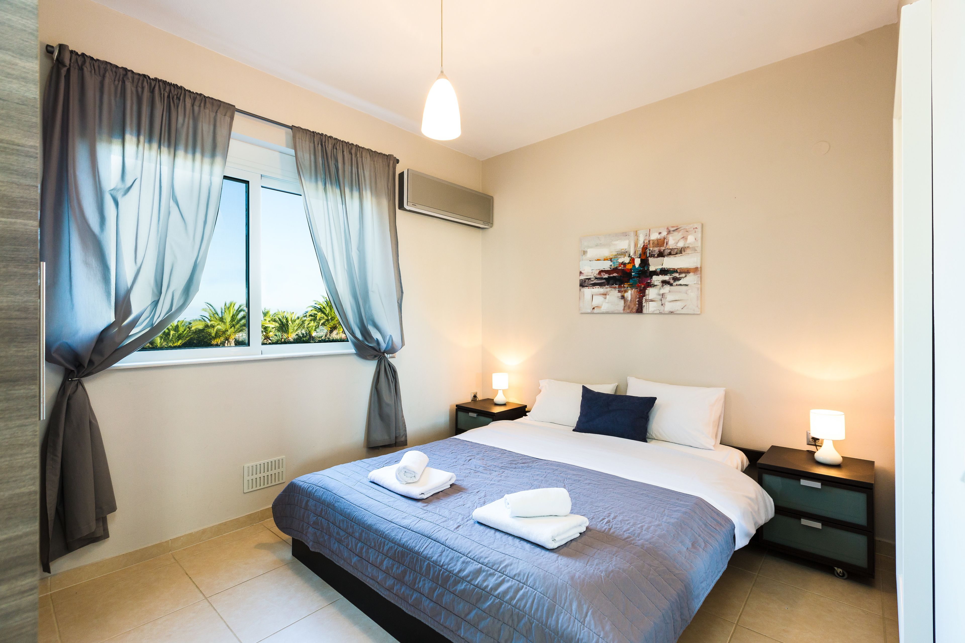 Deluxe Apartment, 2 Bedrooms, Pool View | 2 bedrooms, individually decorated, individually furnished