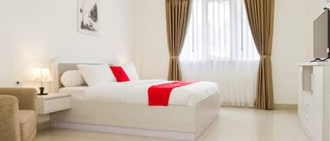 Habitación Deluxe | Escritorio, wifi gratis y ropa de cama