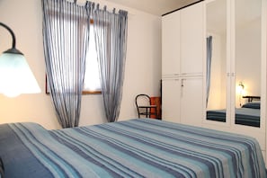 Apartment, 2 Bedrooms | 2 bedrooms, cots/infant beds, rollaway beds, free WiFi - Appartamento le Peonie Nuragheddu (San Teodoro)