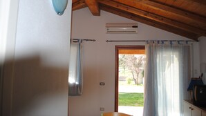 Apartment, 1 Bedroom | Living area - Bilocali Zenzero porto istana (Olbia)