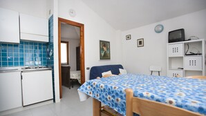 Apartemen, 1 kamar tidur | Makan di kamar
