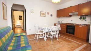Departamento, 1 habitación | Área de sala de estar