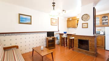 Apartment, 1 Bedroom | Living area | 50-cm LCD TV with satellite channels, TV