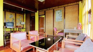 Standard Room, Shared Bathroom | Living area | 32-inch LCD TV with satellite channels, TV