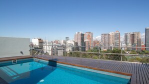 A rooftop pool with a cityscape view. - Las Heras by Be Local Argentina (Buenos Aires)